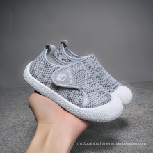 Wholesale Custom Grey Pink Boys Girls Toddler Walking Shoes Anti-skid PVC Sole Fly Knitting Upper Breathable Kids Casual Shoes